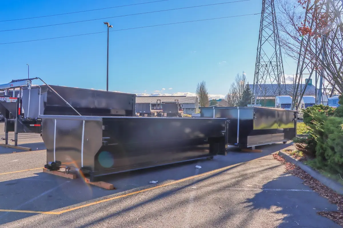 Roll-off dumpster ready for waste disposal at job site for Estate Cleanout Dumpster Rental in Pomona